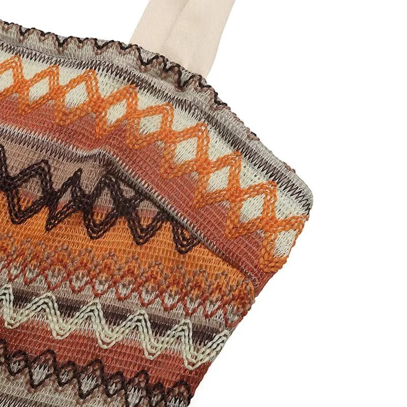 Combinaison beige La Binta en viscose avec haut brodé ethnique et bretelles à nœuds. Maison de la combi.