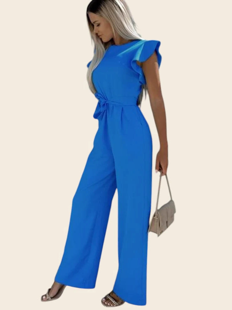Combinaison femme chic mariage bleue. Silhouette élancée grâce au pantalon coupe palazzo.