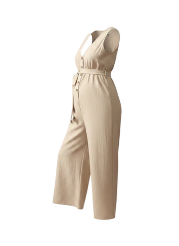 Vue de trois quarts de la combinaison pantalon 
grossesse beige. Tissu au tombé naturel et fluide.