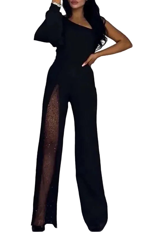 Combinaison noir épaule asymétrique modèle Léna avec manche longue unique et fente latérale incrustée de strass.