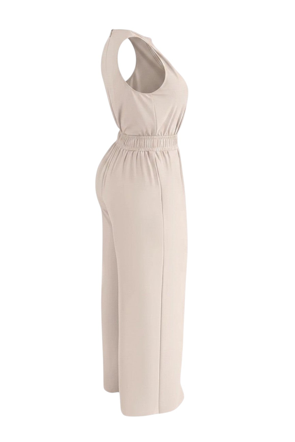 Combinaison femme beige La mandrinoise, col V, ceinture dorée, pantalon palazzo, polyester et coton.
