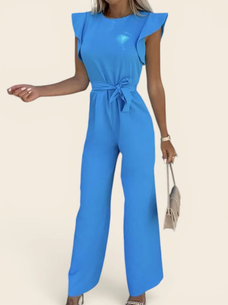 Tenue d'invitée de mariage : combinaison pantalon bleu roi chic. Tissu infroissable et coupe élégante.